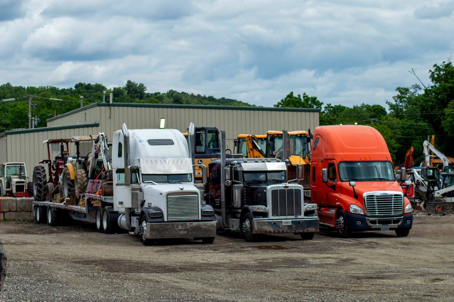 Three Iron Road Logistics Haulers Loaded with Equipment to Transport