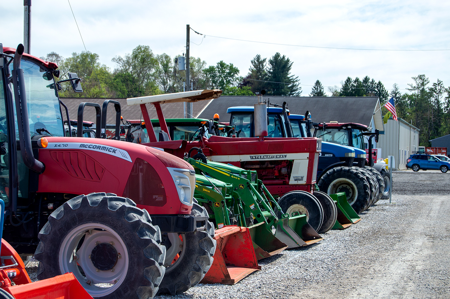 Various Used Tractors Lined Up for Auction